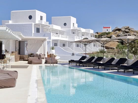 Exterior view of hotel and outdoor pool